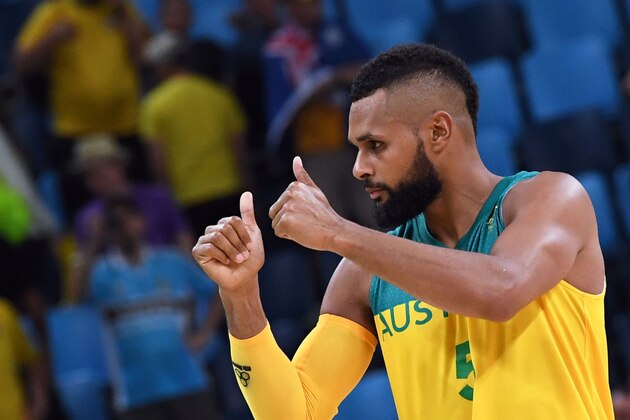 Australia's guard Patty Mills reacts after defeating Lithuania during a Men's quarterfinal basketball match between Australia and Lithuania at the Carioca Arena 1 in Rio de Janeiro on August 17, 2016 during the Rio 2016 Olympic Games. / AFP / Mark RALSTON        (Photo credit should read MARK RALSTON/AFP/Getty Images)