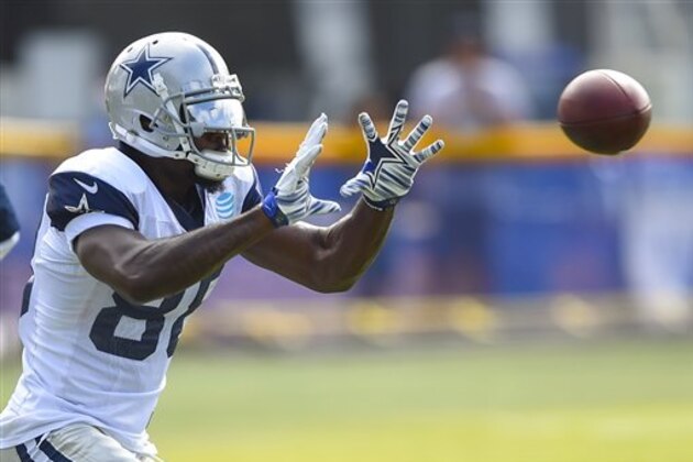 Dallas Cowboys wide receiver Dez Bryant makes a reception during practice at the NFL football team's training camp in Oxnard, Calif., Tuesday, Aug. 2, 2016. (AP Photo/Gus Ruelas)