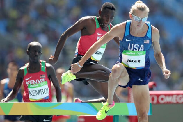 United States' Evan Jager leads Kenya's Conseslus Kipruto and Kenya's Ezekiel Kemboi, from right, in the men's 3000-meter steeplechase final during the athletics competitions of the 2016 Summer Olympics at the Olympic stadium in Rio de Janeiro, Brazil, Wednesday, Aug. 17, 2016. (AP Photo/Lee Jin-man)