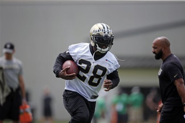 New Orleans Saints running back C.J. Spiller (28) takes part in a drill during the NFL football team's minicamp in Metairie, La., Tuesday, June 14, 2016. (AP Photo/Gerald Herbert)