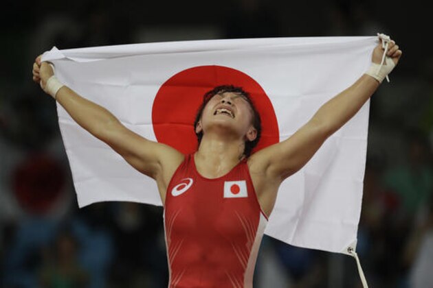 Japan's Eri Tosaka celebrates winning gold against Azerbaijan Mariya Stadnik in the women's wrestling freestyle 48-kg competition at the 2016 Summer Olympics in Rio de Janeiro, Brazil, Wednesday, Aug. 17, 2016. (AP Photo/Markus Schreiber)