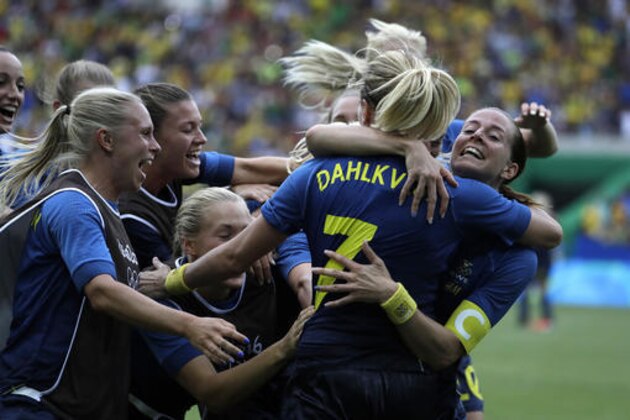 Sweden's players celebrate after the penalty kicks during a semi-final match of the women's Olympic football tournament between Brazil and Sweden at the Maracana stadium in Rio de Janeiro Tuesday Aug. 16, 2016. Sweden qualified for the final after beating Brazil on a penalty shoot-out.(AP Photo/Natacha Pisarenko)