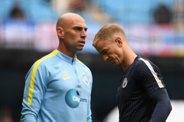 MANCHESTER, ENGLAND - AUGUST 13:  Manchester City goalkeepers Willy Caballero (l) and Joe Hart look on during the warm up before the Premier League match between Manchester City and Sunderland at Etihad Stadium on August 13, 2016 in Manchester, England.  (Photo by Stu Forster/Getty Images)