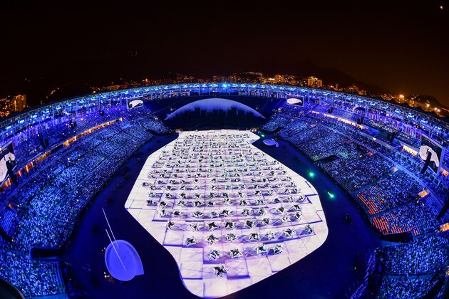 TOPSHOT - This picture shows an overview during the beginning of the opening ceremony of the Rio 2016 Olympic Games at the Maracana stadium in Rio de Janeiro on August 5, 2016. / AFP / François-Xavier MARIT        (Photo credit should read FRANCOIS-XAVIER MARIT/AFP/Getty Images)