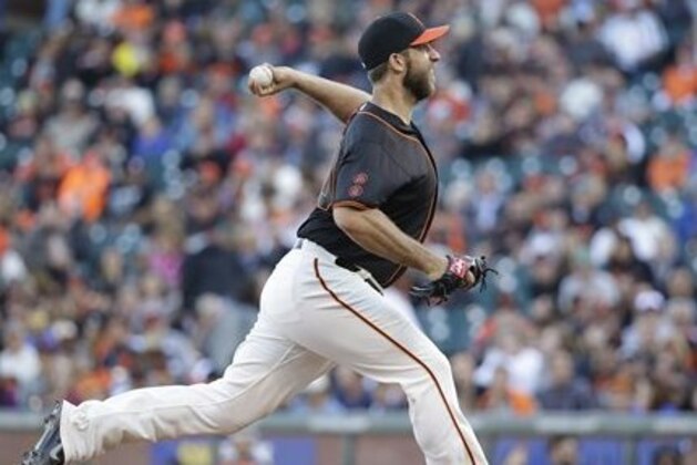 San Francisco Giants starting pitcher Madison Bumgarner throws in the first inning of a baseball game against the Baltimore Orioles Saturday, Aug. 13, 2016, in San Francisco. (AP Photo/Eric Risberg)