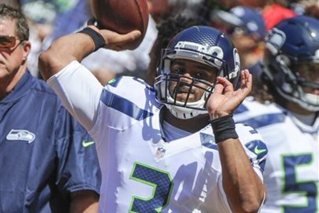 Seattle Seahawks quarterback Russell Wilson (3) throws before an NFL preseason football game against the Kansas City Chiefs in Kansas City, Mo., Saturday, Aug. 13, 2016. (AP Photo/Ed Zurga)