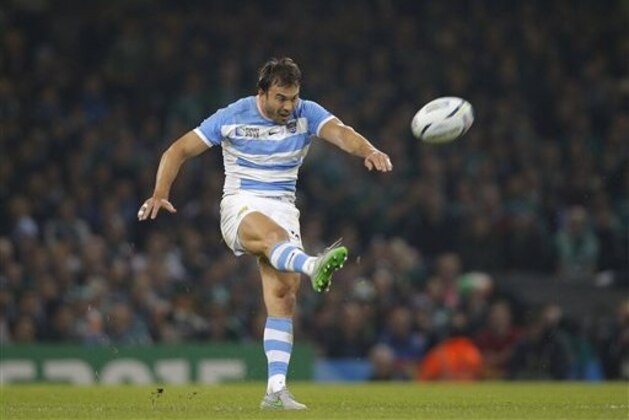 Argentina's Juan Martin Hernandez kicks the ball during the Rugby World Cup quarterfinal match between Ireland and Argentina at the Millennium Stadium in Cardiff, Wales,  Sunday, Oct. 18, 2015. (AP Photo/Christophe Ena)