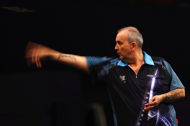 ROTTERDAM, NETHERLANDS - MAY 12:  Phil 'The Power' Taylor of England plays a shot in his match against Michael van Gerwen of the Netherlands during the Darts Betway Premier League Night 15 at Rotterdam Ahoy on May 12, 2016 in Rotterdam, .  (Photo by Dean Mouhtaropoulos/Getty Images)