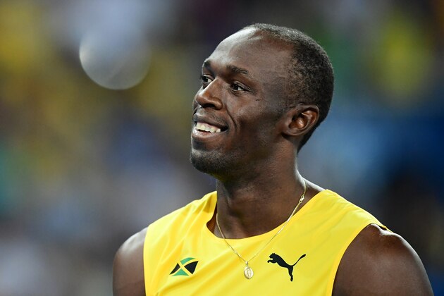 Jamaica's Usain Bolt smiles in the Men's 200m Semifinal during the athletics event at the Rio 2016 Olympic Games at the Olympic Stadium in Rio de Janeiro on August 17, 2016.   / AFP / FRANCK FIFE        (Photo credit should read FRANCK FIFE/AFP/Getty Images)
