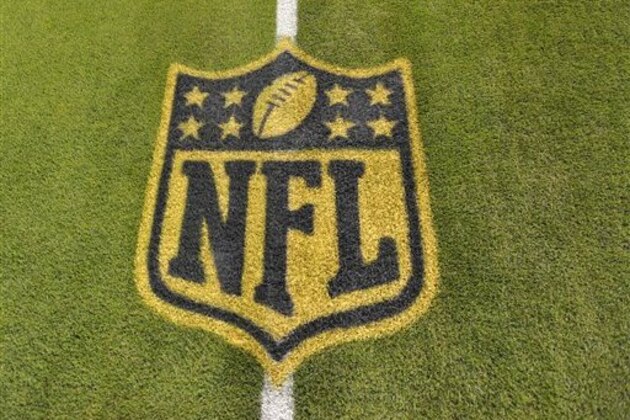 A general view of an NFL logo on the 50-yard line prior to an NFL football game between the Cleveland Browns and the Baltimore Ravens Monday, Nov. 30, 2015, in Cleveland. Baltimore won 33-27. (AP Photo/David Richard)