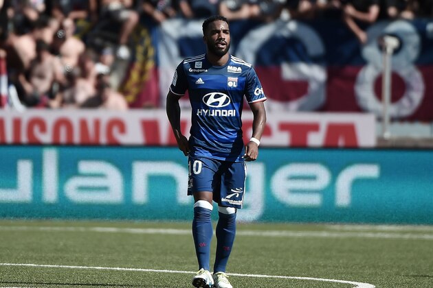 Lyon's French forward Alexandre Lacazette celebrates after scoring a goal during the French L1 football match between Nancy (ASNL) and Lyon (OL), on August 14, 2016 at the Marcel Picot Stadium, in Tomblaine, eastern France.  / AFP / FREDERICK FLORIN        (Photo credit should read FREDERICK FLORIN/AFP/Getty Images)