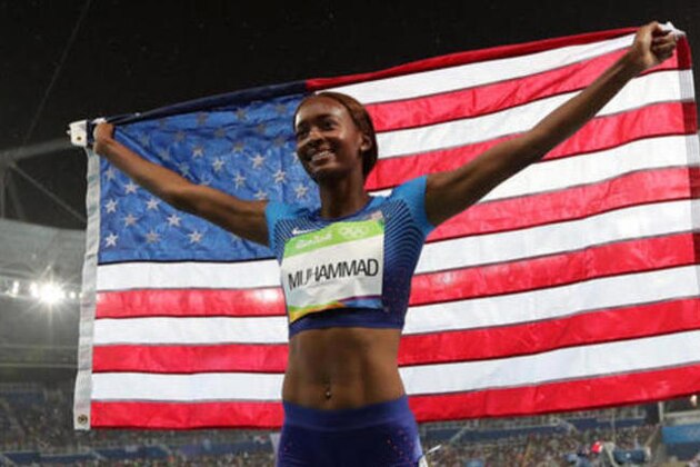 Dalilah Muhammad from the United States celebrates her gold medal in the women's 400-meter hurdles final during the athletics competitions of the 2016 Summer Olympics at the Olympic stadium in Rio de Janeiro, Brazil, Thursday, Aug. 18, 2016. (AP Photo/Lee Jin-man)
