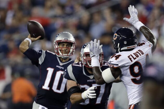 New England Patriots quarterback Jimmy Garoppolo (10) passes against a rush by Chicago Bears linebacker Leonard Floyd (94) during the second half of a preseason NFL football game Thursday, Aug. 18, 2016, in Foxborough, Mass. (AP Photo/Charles Krupa)