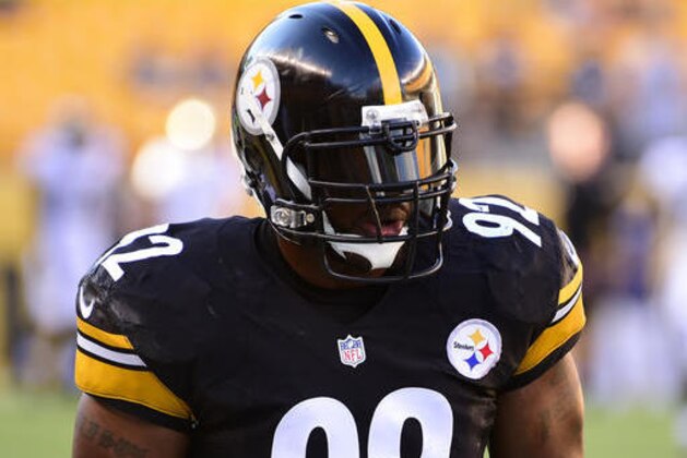 Pittsburgh Steelers outside linebacker James Harrison warms up prior to the team's NFL preseason football game against the Philadelphia Eagles in Pittsburgh, on Thursday, Aug. 18, 2016. (AP Photo/Fred Vuich)