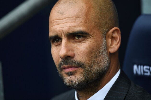 Manchester City's Spanish manager Pep Guardiola waits for kick off of the English Premier League football match between Manchester City and Sunderland at the Etihad Stadium in Manchester, north west England, on August 13, 2016. / AFP / PAUL ELLIS / RESTRICTED TO EDITORIAL USE. No use with unauthorized audio, video, data, fixture lists, club/league logos or 'live' services. Online in-match use limited to 75 images, no video emulation. No use in betting, games or single club/league/player publications.  /         (Photo credit should read PAUL ELLIS/AFP/Getty Images)