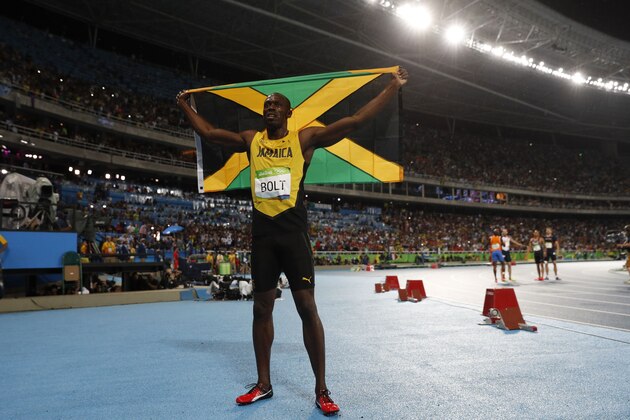 Jamaica's Usain Bolt celebrates after he won the Men's 200m Final during the athletics event at the Rio 2016 Olympic Games at the Olympic Stadium in Rio de Janeiro on August 18, 2016.   / AFP / Adrian DENNIS        (Photo credit should read ADRIAN DENNIS/AFP/Getty Images)