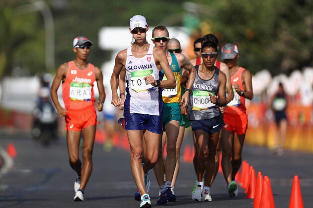 RIO DE JANEIRO, BRAZIL - AUGUST 19:  Matej Toth of Slovakia (C) competes in the Men's 50km Race Walk on Day 14 of the Rio 2016 Olympic Games at Pontal on August 19, 2016 in Rio de Janeiro, Brazil.  (Photo by Bryn Lennon/Getty Images)
