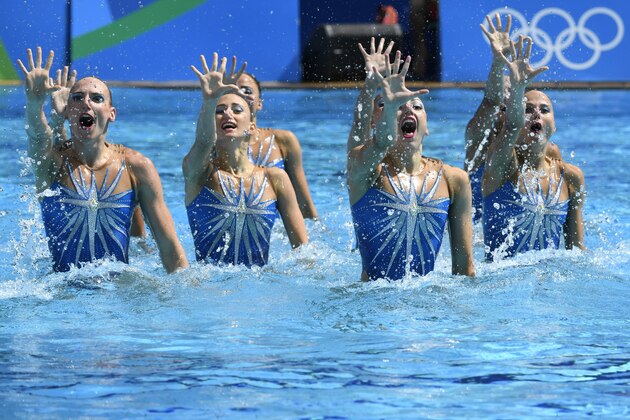 Team Russia competes in the Teams Free Routine final during the synchronised swimming event at the Maria Lenk Aquatics at the Rio 2016 Olympic Games in Rio de Janeiro on August 19, 2016.  / AFP / CHRISTOPHE SIMON        (Photo credit should read CHRISTOPHE SIMON/AFP/Getty Images)