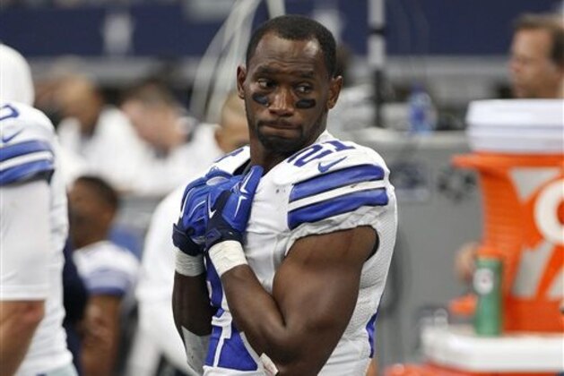 FILE - In this Sept. 27, 2015, file photo, Dallas Cowboys' Joseph Randle stands in the team bench area during an NFL football game against the Atlanta Falcons, in Arlington, Texas. Former Dallas Cowboys running back Joseph Randle was jailed early Wednesday, Nov. 25, 2015,  after an altercation at a Kansas casino. Randle was asked to leave the Kansas Star Casino in Mulvane late Tuesday after causing some unspecified concerns on the casino floor, said Fred Waller, an enforcement agent with the Kansas Racing and Gaming Commission. Randle left, but then returned. Randle started arguing with security officers, and a scuffle ensued, Waller said. Several agents had to restrain him and he was taken to the county jail. (AP Photo/Brandon Wade, File)