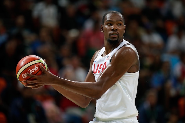RIO DE JANEIRO, BRAZIL - AUGUST 14:  Kevin Durant #5 of United States looks on during a Men's Preliminary Round Group A game between the United States and France on Day 9 of the Rio 2016 Olympic Games at Carioca Arena 1 on August 14, 2016 in Rio de Janeiro, Brazil.  (Photo by Jamie Squire/Getty Images)