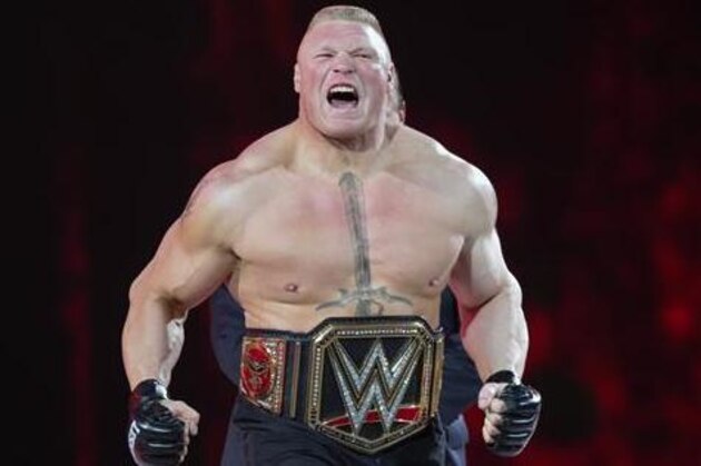 FILE - In this March 29, 2015, file photo, Brock Lesnar makes his entrance at Wrestlemania XXXI in Santa Clara, Calif. UFC 200 has grown so big that a single show can’t contain it. The mixed martial arts promotion is throwing an “International Fight Week” in Las Vegas with compelling shows on three consecutive nights, culminating in the star-studded pay-per-view event Saturday. Jon Jones meets light heavyweight champion Daniel Cormier in the main event of a card also featuring the return of former heavyweight champ Brock Lesnar. (AP Photo/Don Feria, File)