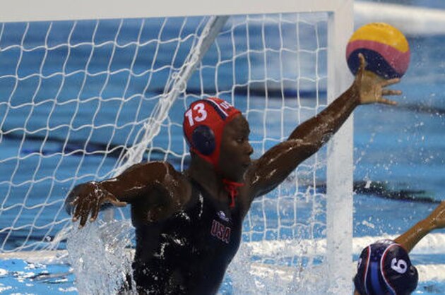 United States' goalkeeper Ashleigh Johnson, makes a save during their women's semifinal water polo match against Hungary at the 2016 Summer Olympics in Rio de Janeiro, Brazil, Wednesday, Aug. 17, 2016. (AP Photo/Eduardo Verdugo)
