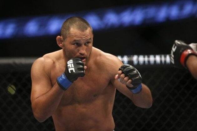 Lyoto Machida Dan Henderson during their UFC 157 light heavyweight mixed martial arts match in Anaheim, Calif., Saturday, Feb. 23, 2013. Machida won by split decision after the third round. (AP Photo/Jae C. Hong)