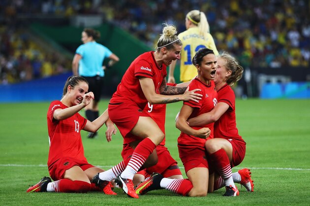 RIO DE JANEIRO, BRAZIL - AUGUST 19:  Dzsenifer Marozsan (2nd right) of Germany is congratulated by team mates after scoring during the Women's Olympic Gold Medal match between Sweden and Germany at Maracana Stadium on August 19, 2016 in Rio de Janeiro, Brazil.  (Photo by Clive Brunskill/Getty Images)