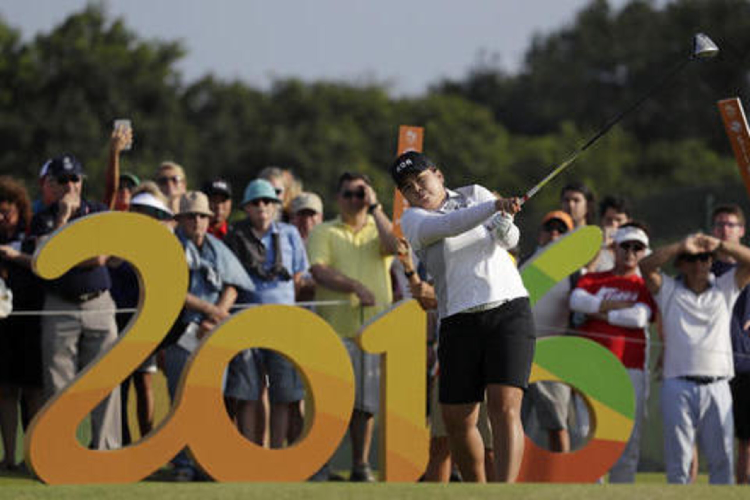 Inbee Park of South Korea tees off on the 16th hole during the third round of the women's golf event at the 2016 Summer Olympics in Rio de Janeiro, Brazil, Friday, Aug. 19, 2016. (AP Photo/Alastair Grant)