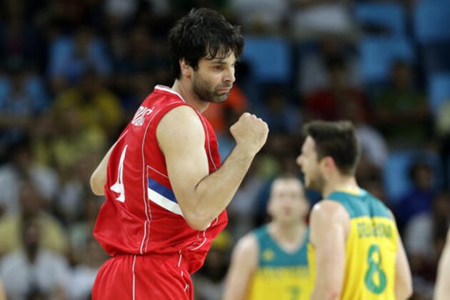 Serbia's Milos Teodosic reacts after making a three-point basket during a semifinal round basketball game against Australia at the 2016 Summer Olympics in Rio de Janeiro, Brazil, Friday, Aug. 19, 2016. (AP Photo/Charlie Neibergall)