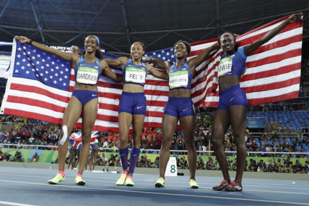 United States's Tianna Bartoletta, second right, Allyson Felix, second left, English Gardner, left, and Tori Bowie ,right, during the athletics competitions of the 2016 Summer Olympics at the Olympic stadium in Rio de Janeiro, Brazil, Friday, Aug. 19, 2016. (AP Photo/Matt Dunham)