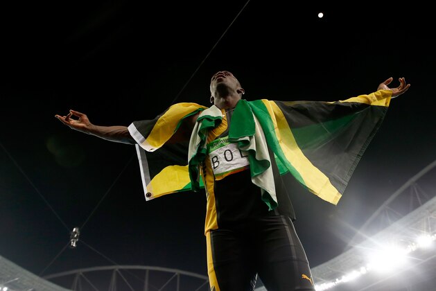 RIO DE JANEIRO, BRAZIL - AUGUST 19:  Usain Bolt of Jamaica celebrates winning the Men's 4 x 100m Relay Final on Day 14 of the Rio 2016 Olympic Games at the Olympic Stadium on August 19, 2016 in Rio de Janeiro, Brazil.  (Photo by Phil Walter/Getty Images)