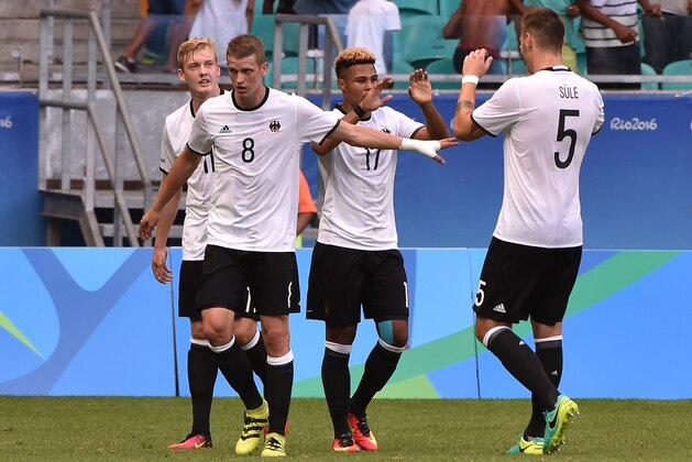 Serge Gnabry (C) of Germany celebrates with teammates his goal against South Korea during the Rio 2016 Olympic Games mens first round Group C football match Germany vs South Korea, at the Arena Fonte Nova Stadium in Salvador, Brazil on August 7, 2016. / AFP / NELSON ALMEIDA (Photo credit should read NELSON ALMEIDA/AFP/Getty Images) Serge Gnabry (C) of Germany celebrates with teammates his goal against South Korea during the Rio 2016 Olympic Games mens first round Group C football match Germany vs South Korea, at the Arena Fonte Nova Stadium in Salvador, Brazil on August 7, 2016. / AFP / NELSON ALMEIDA (Photo credit should read NELSON ALMEIDA/AFP/Getty Images)