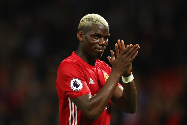 MANCHESTER, ENGLAND - AUGUST 19:  Paul Pogba of Manchester United applauds the fans after the Premier League match between Manchester United and Southampton at Old Trafford on August 19, 2016 in Manchester, England.  (Photo by Michael Steele/Getty Images)