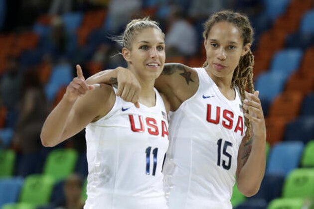 United States' Elena Delle Donne, left, and Brittney Griner walk off the court after a quarterfinal round basketball game against Japan at the 2016 Summer Olympics in Rio de Janeiro, Brazil, Tuesday, Aug. 16, 2016. (AP Photo/Charlie Neibergall)