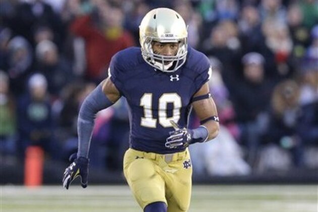 Notre Dame safety Max Redfield (10) runs on the field during the first half of an NCAA college football game against Northwestern in South Bend, Ind., Saturday, Nov. 15, 2014. (AP Photo/Nam Y. Huh)
