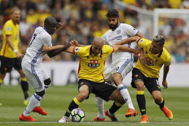 Watford's Nordin Amrabat, center challenges for the ball against Chelsea's Diego Costa, second right, during the English Premier League soccer match between Watford and Chelsea at Vicarage Road stadium in London, Saturday, Aug. 20, 2016.(AP Photo/Frank Augstein)