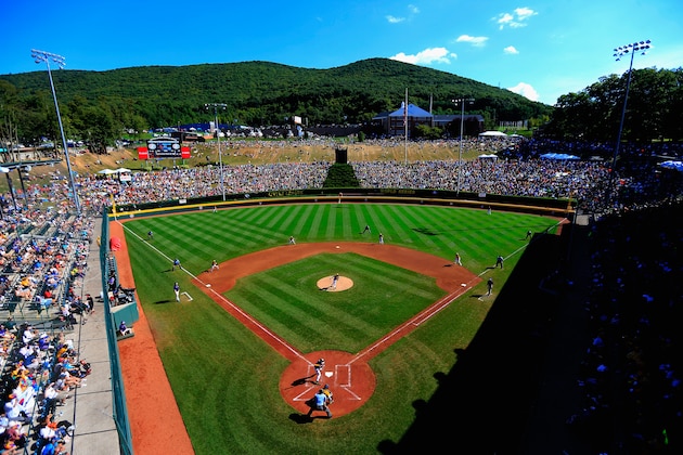 SOUTH WILLIAMSPORT, PA - AUGUST 24:  Team Asia-Pacific  bats against the Great Lakes Team from Chicago, Illinois during the Little League World Series Championship game at Lamade Stadium on August 24, 2014 in South Williamsport, Pennsylvania.  (Photo by Rob Carr/Getty Images)