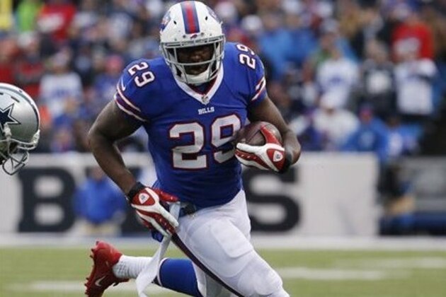 Buffalo Bills running back Karlos Williams (29) carries the ball against the Dallas Cowboys during the first half of an NFL football game, Sunday, Dec. 27, 2015, in Orchard Park, N.Y. (AP Photo/Bill Wippert)