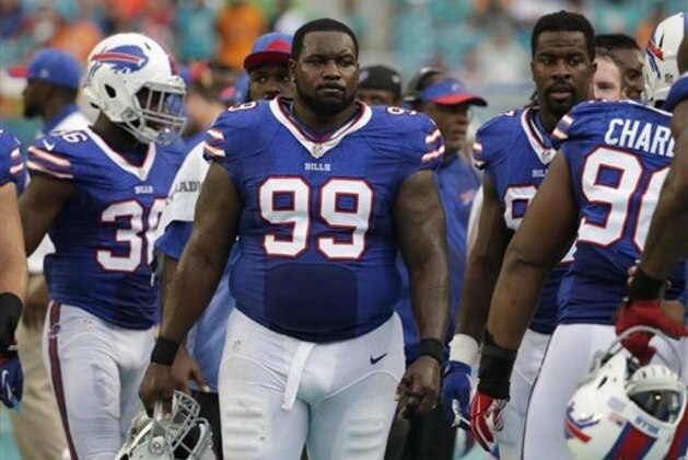 Buffalo Bills defensive tackle Marcell Dareus (99) walks the sidelines during the first half of an NFL football game against the Miami Dolphins, Sunday, Sept. 27, 2015 in Miami Gardens, Fla. (AP Photo/Lynne Sladky)