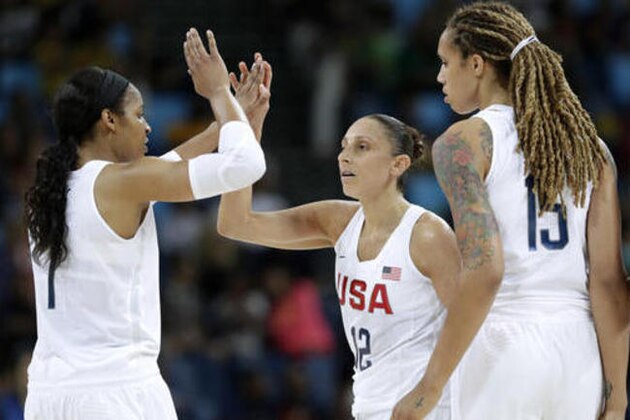 United States' Diana Taurasi, center, celebrates with teammates Maya Moore, left, and Brittney Griner, right, during a quarterfinal round basketball game at the 2016 Summer Olympics in Rio de Janeiro, Brazil, Tuesday, Aug. 16, 2016. (AP Photo/Charlie Neibergall)