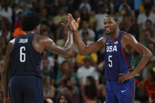 RIO DE JANEIRO, BRAZIL - AUGUST 19:  DeAndre Jordan #6 and Kevin Durant #5 of United States celebrate a play against Spain during the Men's Semifinal match on Day 14 of the Rio 2016 Olympic Games at Carioca Arena 1 on August 19, 2016 in Rio de Janeiro, Brazil.  (Photo by Christian Petersen/Getty Images)
