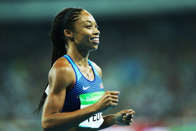 RIO DE JANEIRO, BRAZIL - AUGUST 19:   Allyson Felix of the United States celebrates winning gold in the Women's 4 x 100m Relay  Final on Day 14 of the Rio 2016 Olympic Games at the Olympic Stadium on August 19, 2016 in Rio de Janeiro, Brazil. (Photo by Ian MacNicol/Getty Images)