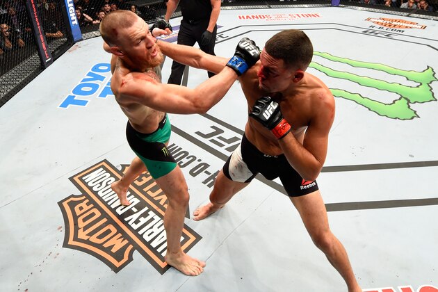 LAS VEGAS, NV - AUGUST 20:  Nate Diaz fights Conor McGregor of Ireland in their welterweight bout during the UFC 202 event at T-Mobile Arena on August 20, 2016 in Las Vegas, Nevada.  (Photo by Josh Hedges/Zuffa LLC/Zuffa LLC via Getty Images)