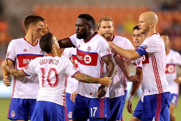 Aug 14, 2016; Houston, TX, USA; Toronto FC forward Jozy Altidore (17) celebrates with teammates after scoring a goal against the Houston Dynamo during the first half at BBVA Compass Stadium. Mandatory Credit: Erik Williams-USA TODAY Sports Aug 14, 2016; Houston, TX, USA; Toronto FC forward Jozy Altidore (17) celebrates with teammates after scoring a goal against the Houston Dynamo during the first half at BBVA Compass Stadium. Mandatory Credit: Erik Williams-USA TODAY Sports