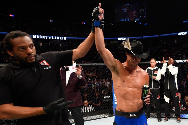 LAS VEGAS, NV - AUGUST 20:  Donald Cerrone celebrates after defeating Rick Story in their welterweight bout during the UFC 202 event at T-Mobile Arena on August 20, 2016 in Las Vegas, Nevada.  (Photo by Josh Hedges/Zuffa LLC/Zuffa LLC via Getty Images)