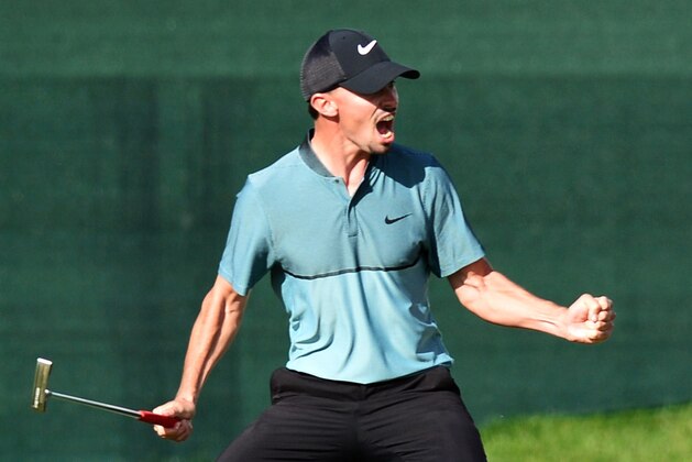 PRAGUE, CZECH REPUBLIC - AUGUST 21:  Paul Peterson of United States celebrates after holing his putt on the 18th hole to win the tournament during day four of the D+D REAL Czech Masters at Albatross Golf Resort on August 21, 2016 in Prague, Czech Republic.  (Photo by Richard Martin-Roberts/Getty Images)
