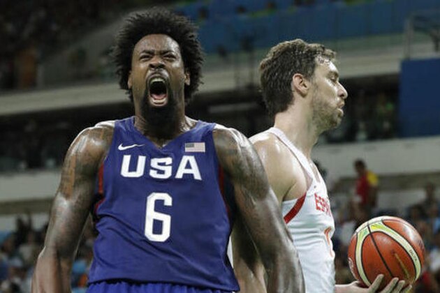 United States' DeAndre Jordan (6) celebrates in front of Spain's Pau Gasol, right, after dunking the ball during a semifinal round basketball game at the 2016 Summer Olympics in Rio de Janeiro, Brazil, Friday, Aug. 19, 2016. (AP Photo/Charlie Neibergall)