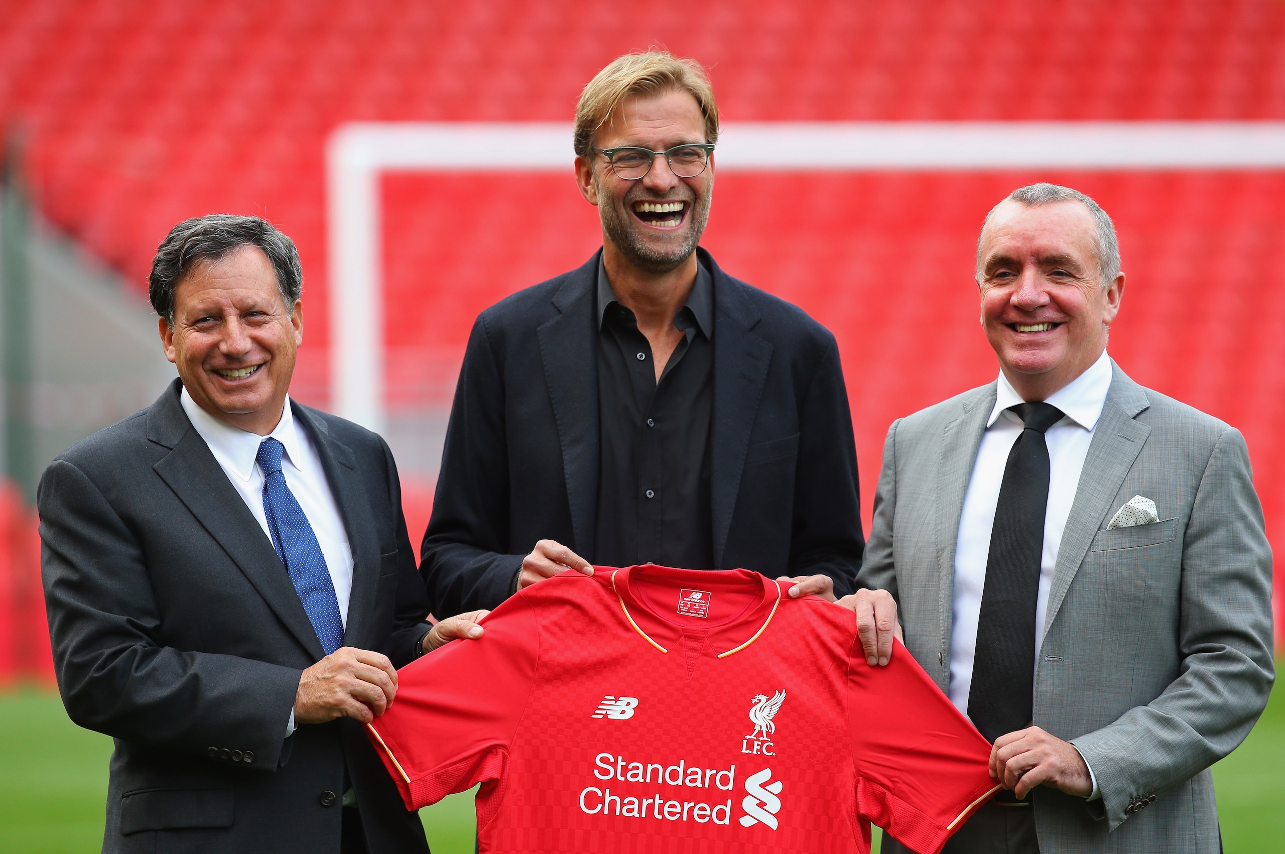 LIVERPOOL, ENGLAND - OCTOBER 09: Jurgen Klopp at Anfield is unveiled as the new manager of Liverpool FC as he stands alongside Tom Werner (l) the chairman and Ian Ayre (r) the chief executive during a photocall at Anfield on October 9, 2015 in Liverpool, England. (Photo by Alex Livesey/Getty Images) LIVERPOOL, ENGLAND - OCTOBER 09: Jurgen Klopp at Anfield is unveiled as the new manager of Liverpool FC as he stands alongside Tom Werner (l) the chairman and Ian Ayre (r) the chief executive during a photocall at Anfield on October 9, 2015 in Liverpool, England. (Photo by Alex Livesey/Getty Images)