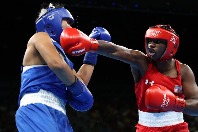 RIO DE JANEIRO, BRAZIL - AUGUST 19:  Claressa Maria Shields of the United States fights Dariga Shakimova of Kazakhstan in the Women's Middle Semifinal 1 on Day 14 of the Rio 2016 Olympic Games at the Riocentro arena on August 19, 2016 in Rio de Janeiro, Brazil.  (Photo by Sean M. Haffey/Getty Images)